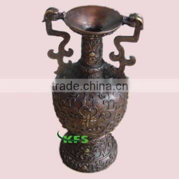 Brass vase with dragon statue