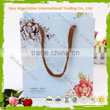 New Design Gift Famous Brand Printed Kraft Paper Bag photo-4