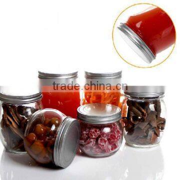 Empty glass canned jar with tin lid