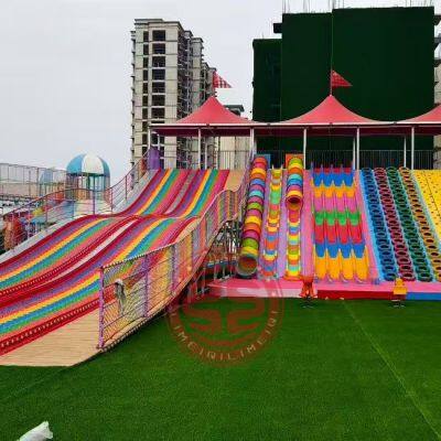 Amusement park ride slide world rianbow slide