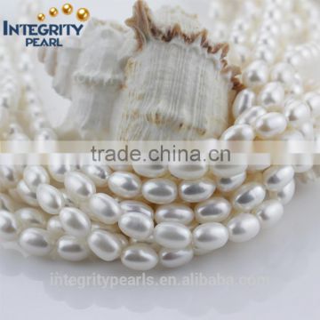 12mm AA- grade oval rice shape cheap white freshwater pearl 15-inch strand