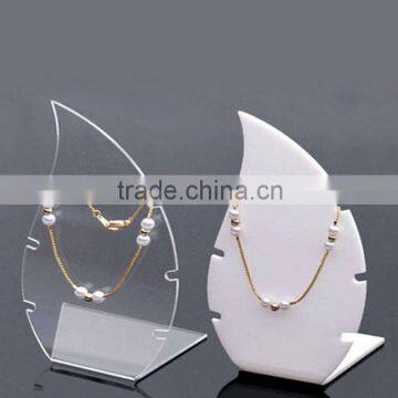 Custom clear/white acrylic jewelry/necklace display stand with beautiful design made in China OEM factory