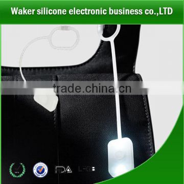 china wholesale growing in dark silicone led bag light handbag led light