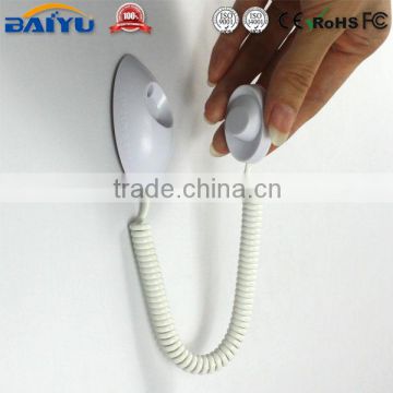 Elegant white plastic mobile phone showing device with spring wire