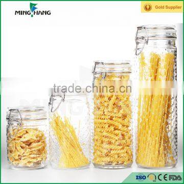 Wholesale glass jars food storage container with flip top cap