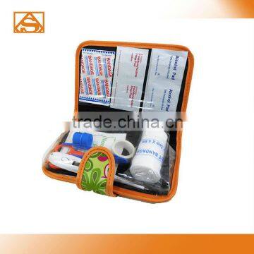 Book style first aid kit with lock