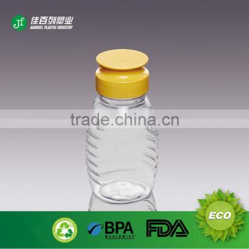 Hot sale transparent bottle online shopping product plastic honey jars pet material food grade honey bottle