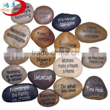 River engraved stone pebble with words