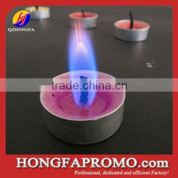 Paraffin wax christmas candle with metal candle holder