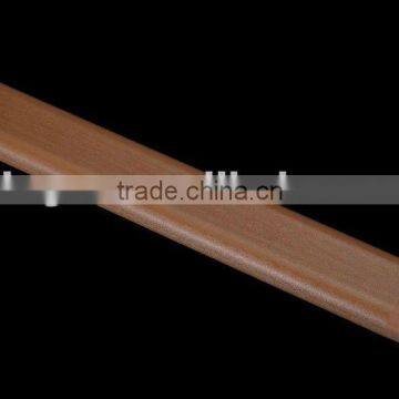 wood grain wall guards protect the wall