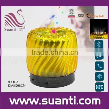 Delicate polyresin round yellow portable bluetooth speaker