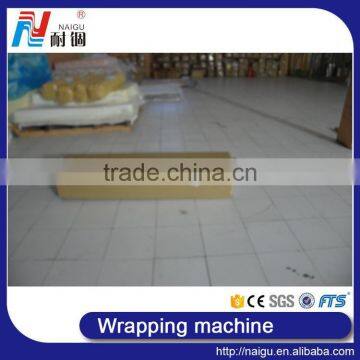 China Foshan NaiGu Manufacturer Semi-automatic Mattress Roll Packing Machine photo-6