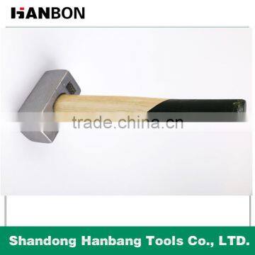 Professional mason's hammer with wooden handle , stone hammer