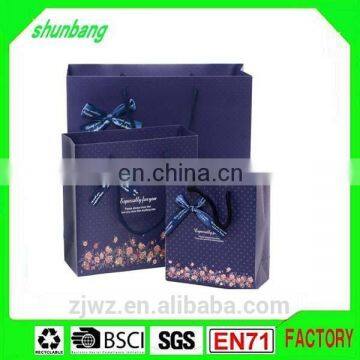 2015 lamination purple color papers bag with bowkont