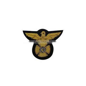 handmade golden metallic thread embroidered badge