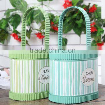 Oval colour painted metal flower planter with handles