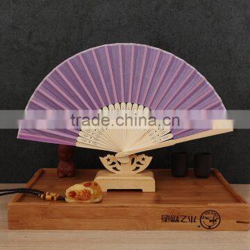 Factory Direct Bamboo Hand Fan Wedding Gift Cloth Folding Hand Fan in Plain Color photo-3