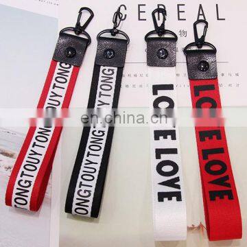 custom logo ribbon keychain phone charms fabric label logo charm hangers logo letter ribbon hangers garment accessories