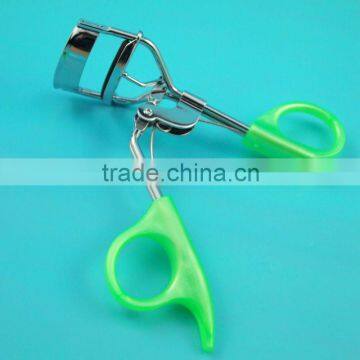 Green colored handle plastic eyelash curler