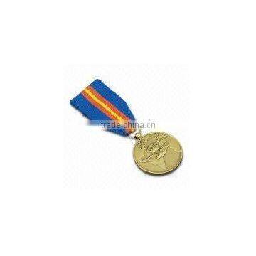 golden medal with lanyard