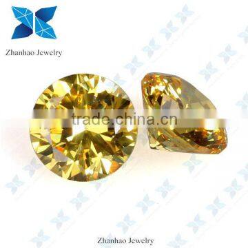 Round brilliant cut light yellow rough synthetic fire CZ stone