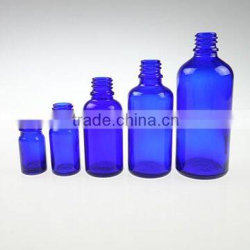 blue glass bottle for essential oil use