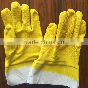 Yellow cotton jersey liner and latex coated poam &crinkle finish