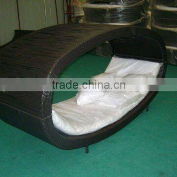 outdoor rattan lounger