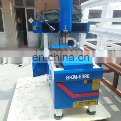 SKM-6090 Whole Cast Iron Body Metal Coin Engraving Machine photo-4