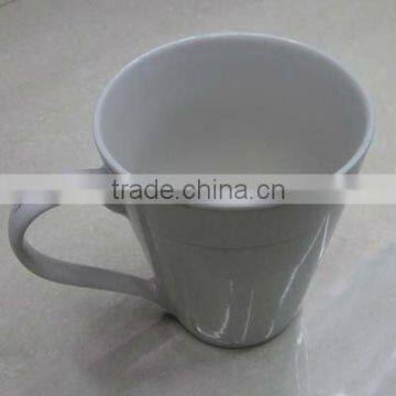 white ceramic cup