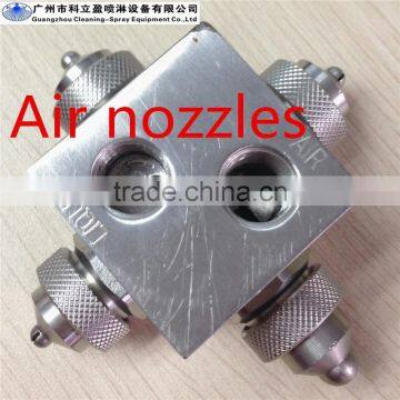 Internal mixing flat spray air atomizing nozzle