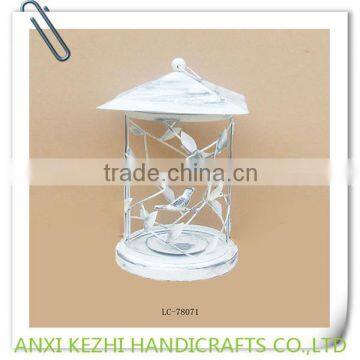 decorative distressed round lantern with birds