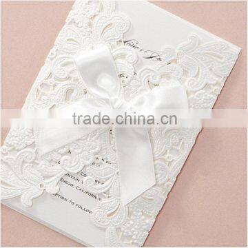 Romantic & unique white swirl laser cut wedding invitations with white ribbons