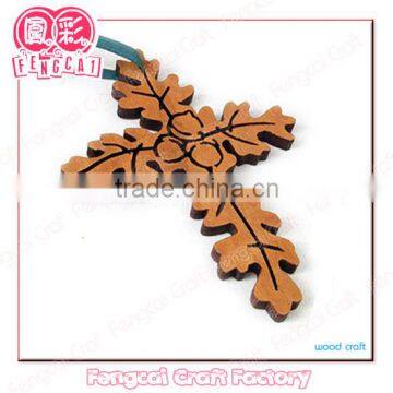 religious wood crucifix with leaf pattern