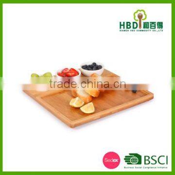 Bamboo chip and dip tray with ceramic bowl