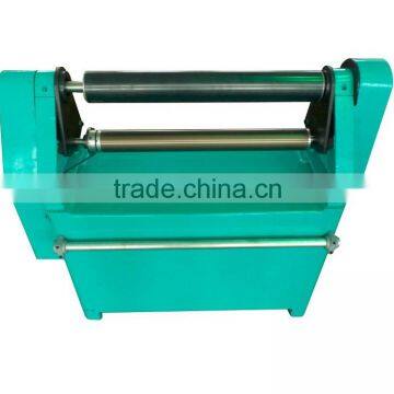 Warping machine tensile roller