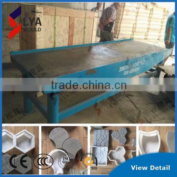 Vibration table for concrete moulds