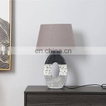 Modern art style grey and white base bedroom ceramic desk lamp for hotel