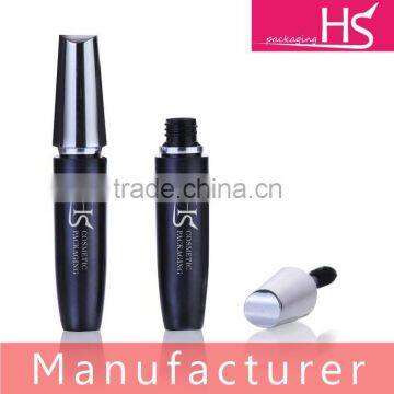 empty plastic mascara tube with metal brush