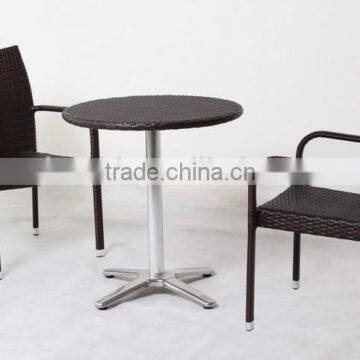 terrace furniture rattan in brown flat wicker for two persons use and one coffee table