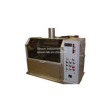 Protective clothing flame spread tester