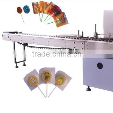 Flat lollipop wrapping machine