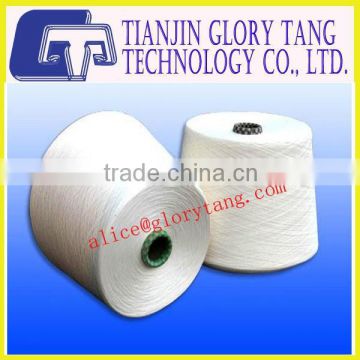 Fire resistant ring spun polyester yarn