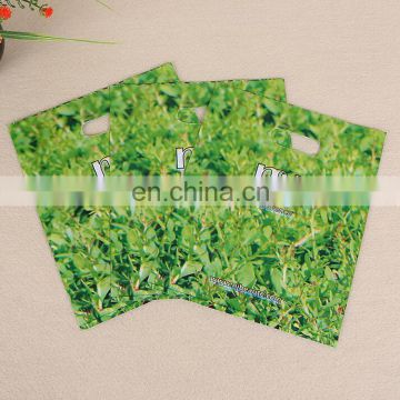 wholesale cheap customized grass printing PE plastic clothes bag,die cut handle plastic shopping bag