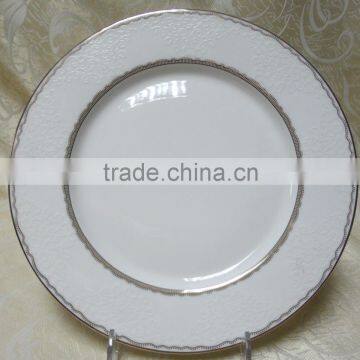 Porcelain flat plate of 10.5" inch with embossed white body