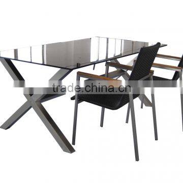 stainless steel frame dining table and rattan chair