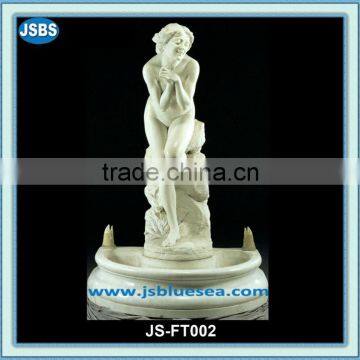 white stone classical garden water fountain with naked lady