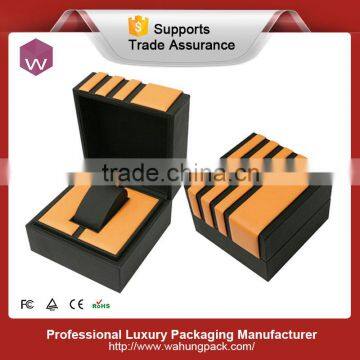 orange color leather watch pillow plastic box