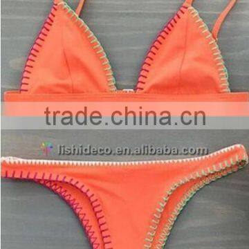 Solid Coral stitched triangle girl bikini