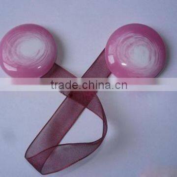 Magnetic button for shower curtain